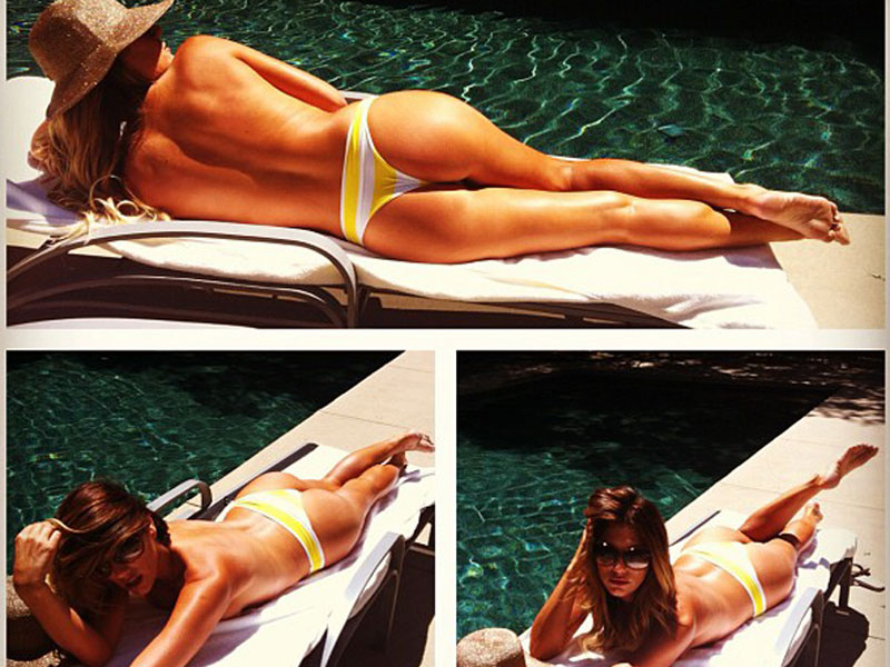 daisy-fuentes-showing-off-her-tanned-bum.jpg